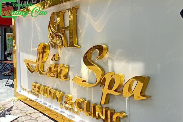 Bảng hiệu nền trắng ánh kim Hân Spa