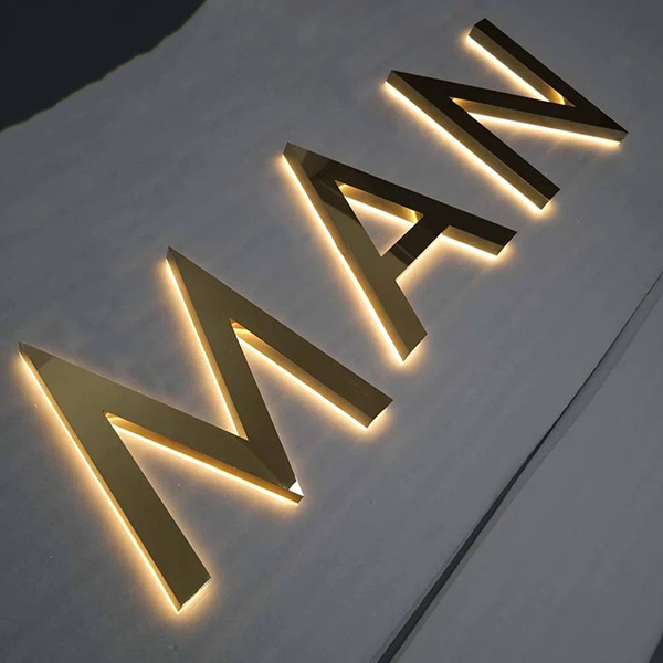 Chữu nổi Inox v&agrave;ng gương hắt s&aacute;ng ch&acirc;n tường