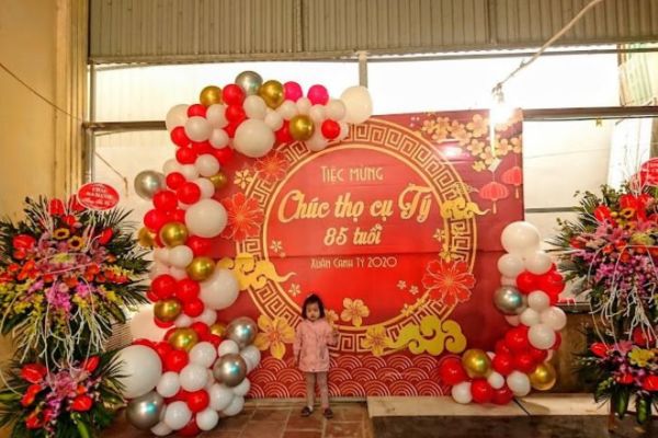 Backdrop mừng thọ tone đỏ vàng sang trọng