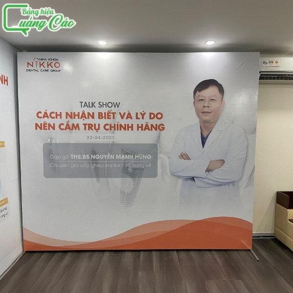 Mẫu backdrop Talkshow Cách nhận biết và lý do nên cắm trụ chính hãng của nha khoa NIKKO tại quận 4